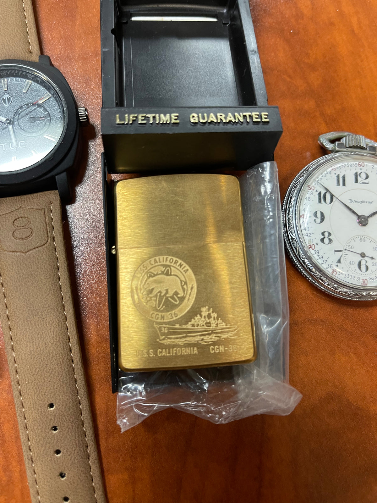 Lot #33 Lot Of Two Watches, A Pocket Watch And A Zippo lighter