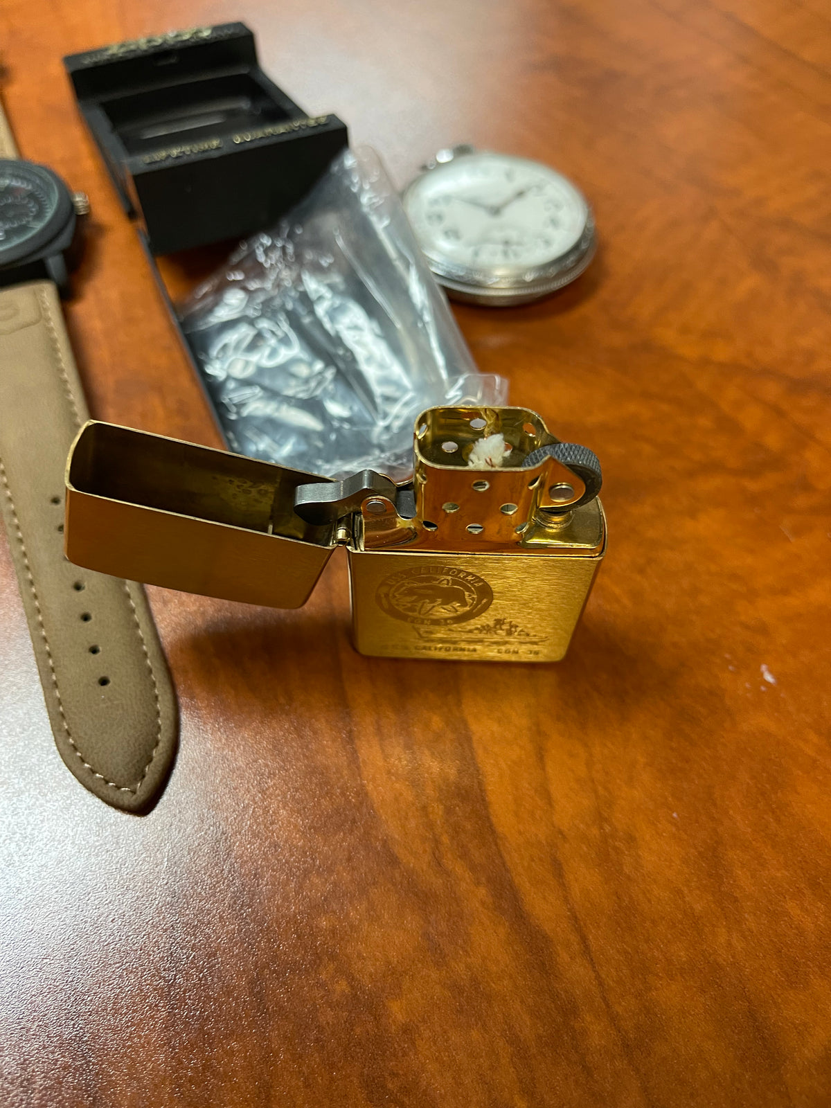 Lot #33 Lot Of Two Watches, A Pocket Watch And A Zippo lighter